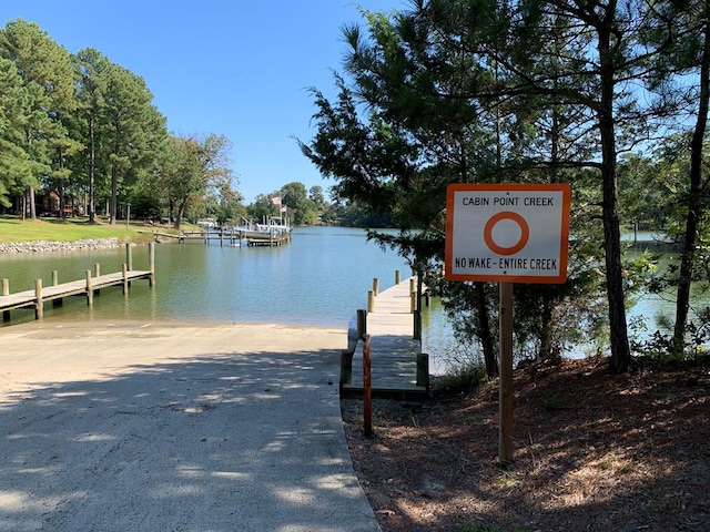 view of dock with a water view