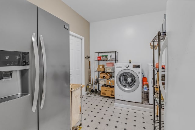 489 Riverview Dr, Heathsville, VA 22473 - laundry area with laundry area, light floors, and separate washer and dryer