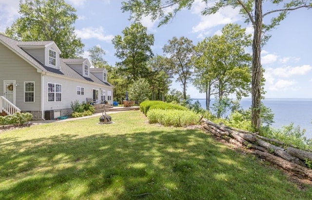 151 Bald Eagle Dr, Montross, VA 22520 - view of green lawn with a water view and cooling unit