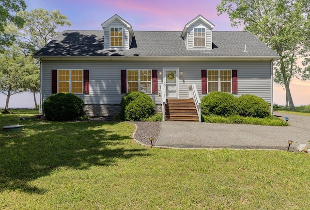 151 Bald Eagle Dr, Montross, VA 22520 - cape cod house with a front lawn and a shingled roof