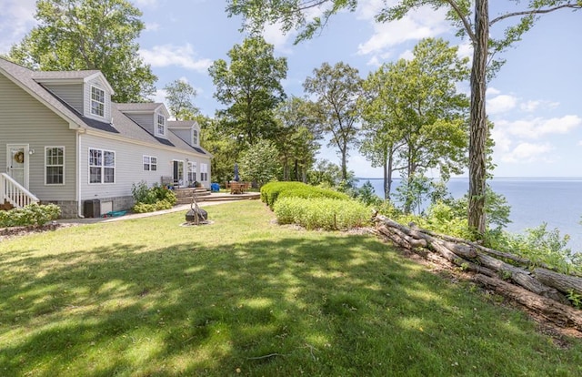 151 Bald Eagle Dr, Montross, VA 22520 - view of green lawn with a water view and cooling unit