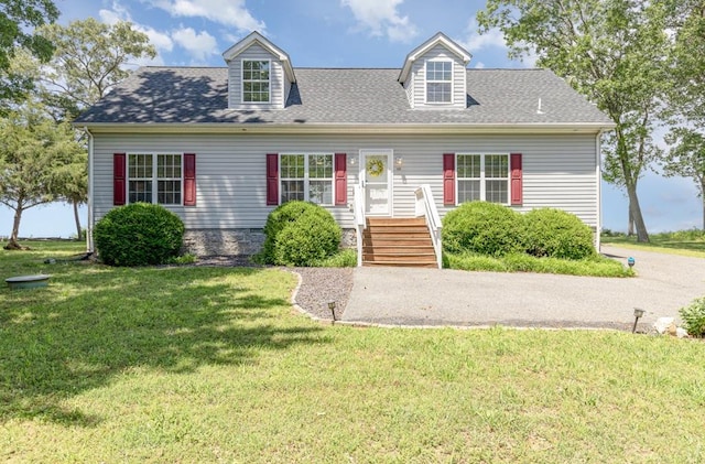 151 Bald Eagle Dr, Montross, VA 22520 - new england style home featuring a front lawn and a shingled roof