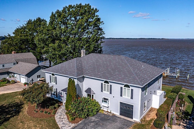 bird's eye view with a water view