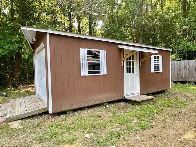 view of outbuilding with a garage