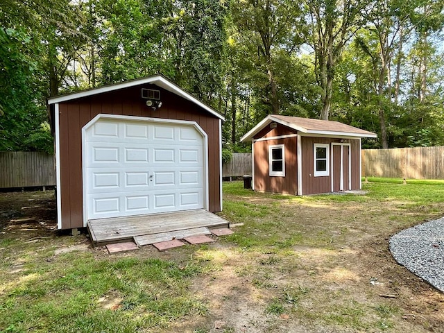 garage with a yard