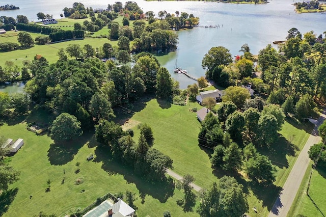 birds eye view of property featuring a water view and a rural view