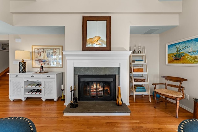 living room with light hardwood / wood-style flooring