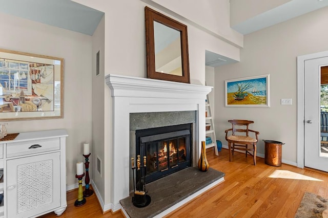 sitting room featuring light wood-type flooring