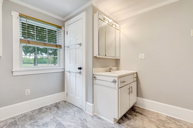 bathroom featuring vanity, marble finish floor, baseboards, and ornamental molding