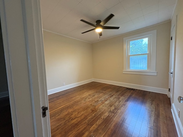 15073 Richmond Rd, Callao, VA 22435 - unfurnished room featuring dark wood-type flooring, ornamental molding, and a ceiling fan