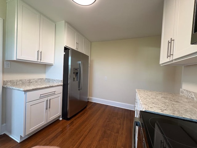 15073 Richmond Rd, Callao, VA 22435 - kitchen featuring stainless steel fridge with ice dispenser, dark wood finished floors, white cabinets, and electric range oven
