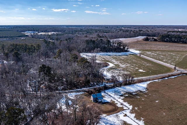 snowy aerial view with a rural view