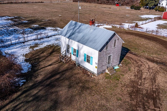 snowy aerial view with a rural view