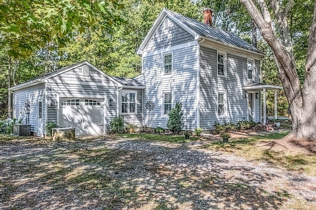 view of home's exterior with a garage