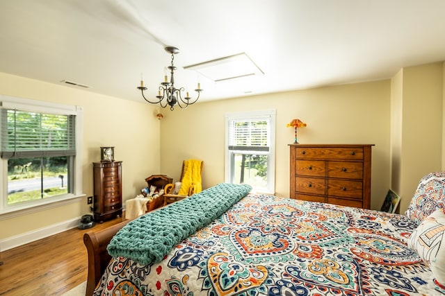 bedroom featuring wood-type flooring