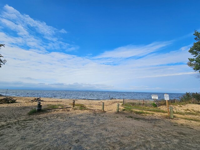 water view featuring fence