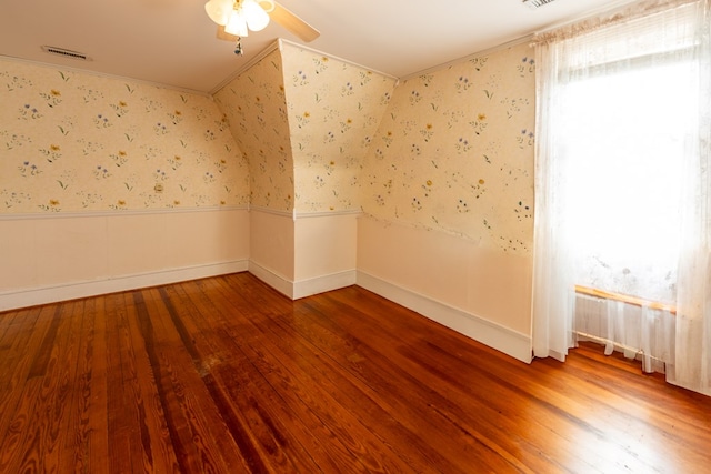 spare room featuring ceiling fan and wood-type flooring