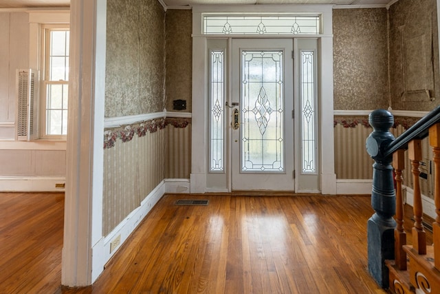 entrance foyer featuring hardwood / wood-style floors