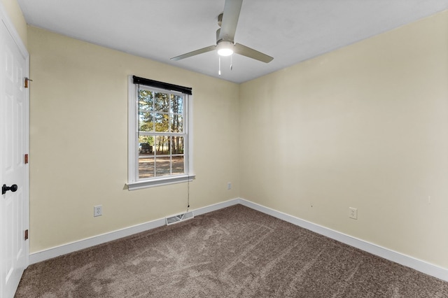 unfurnished room featuring ceiling fan and carpet floors