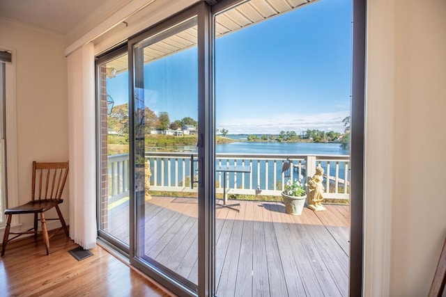 181 Cross St, Urbanna, VA 23175 - entryway featuring a water view, crown molding, and wood finished floors