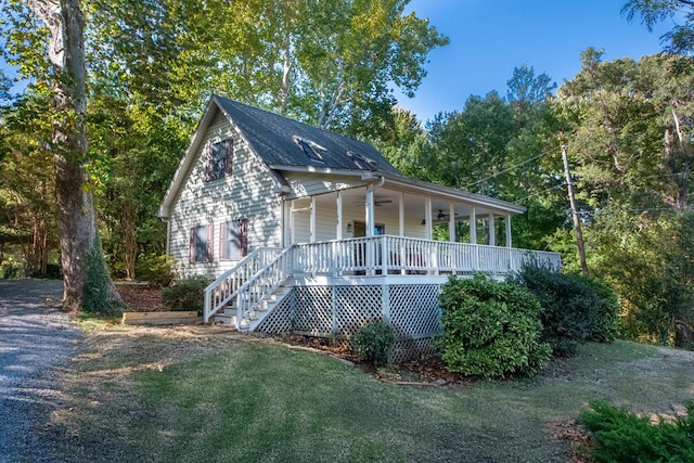 181 Cross St, Urbanna, VA 23175 - view of front of property with covered porch, stairs, a front yard, and ceiling fan