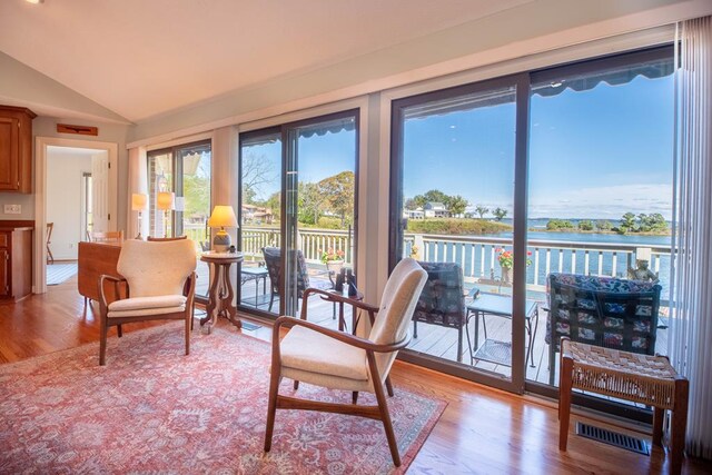 181 Cross St, Urbanna, VA 23175 - sunroom featuring wood finished floors and vaulted ceiling