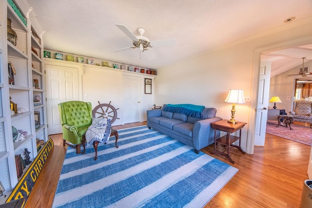 181 Cross St, Urbanna, VA 23175 - living area featuring ceiling fan and light wood-style flooring