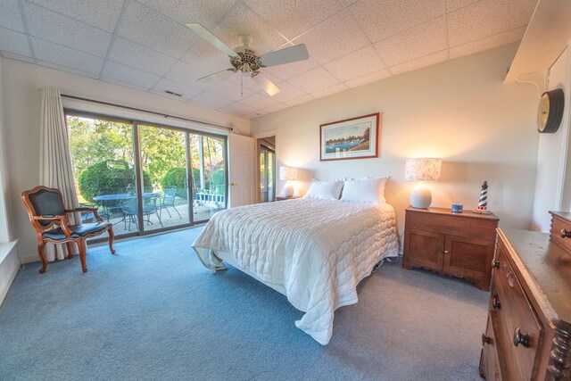 181 Cross St, Urbanna, VA 23175 - carpeted bedroom with access to outside, a paneled ceiling, and ceiling fan