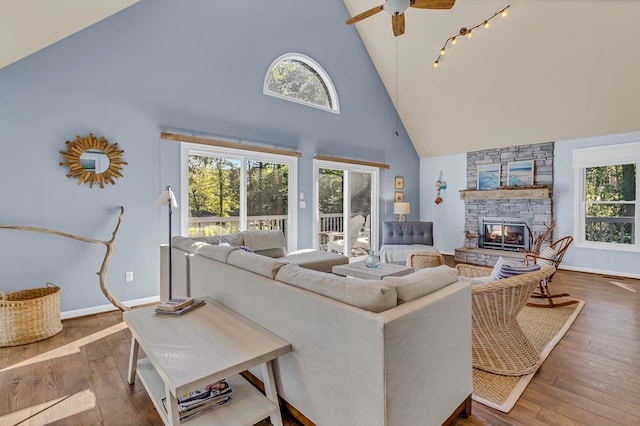 1198 Knights Landing Dr, Heathsville, VA 22473 - living room featuring high vaulted ceiling, plenty of natural light, hardwood / wood-style flooring, a fireplace, and ceiling fan