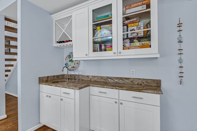 1198 Knights Landing Dr, Heathsville, VA 22473 - indoor wet bar with wood finished floors, stairway, and baseboards