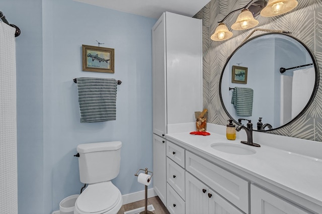1198 Knights Landing Dr, Heathsville, VA 22473 - full bathroom with toilet, vanity, and baseboards
