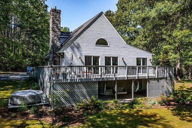 1198 Knights Landing Dr, Heathsville, VA 22473 - back of property with a chimney, a wooden deck, and a yard