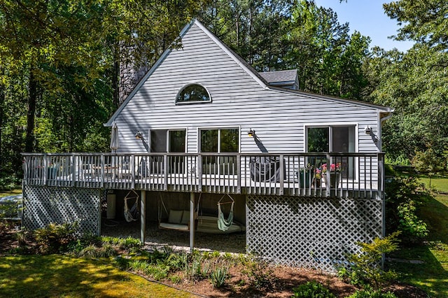 1198 Knights Landing Dr, Heathsville, VA 22473 - rear view of house featuring a deck and a lawn
