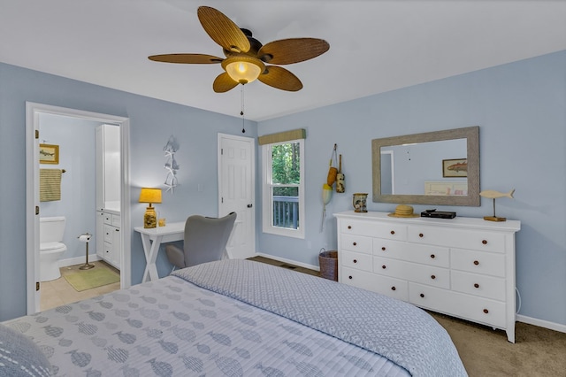 1198 Knights Landing Dr, Heathsville, VA 22473 - bedroom featuring baseboards, connected bathroom, and ceiling fan