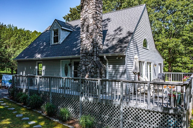 1198 Knights Landing Dr, Heathsville, VA 22473 - back of house with a chimney, a wooden deck, and roof with shingles