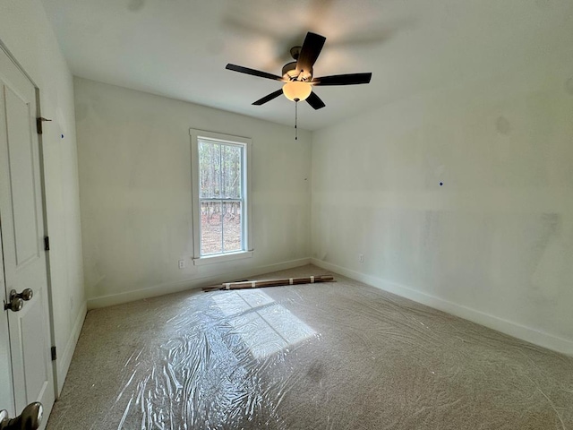 unfurnished bedroom featuring baseboards and ceiling fan