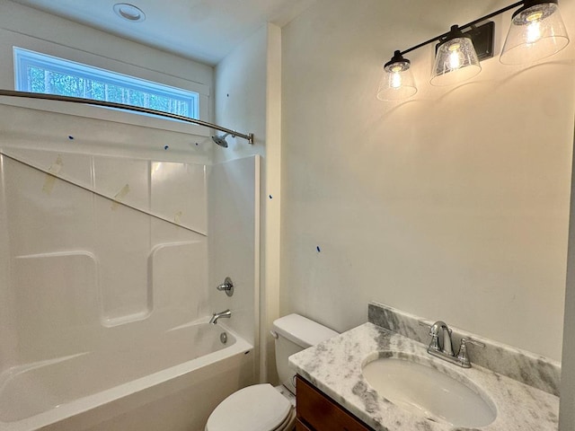 full bathroom with vanity,  shower combination, and toilet