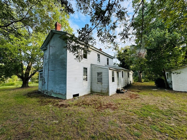 exterior space with a lawn