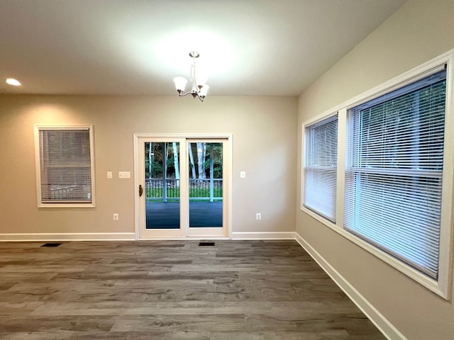 94 Dingley Rd, Va, VA 22520 - unfurnished dining area featuring a chandelier, dark wood-style floors, and recessed lighting