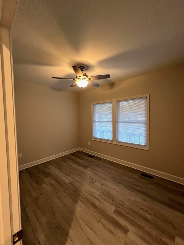 94 Dingley Rd, Va, VA 22520 - spare room featuring dark wood-type flooring and ceiling fan