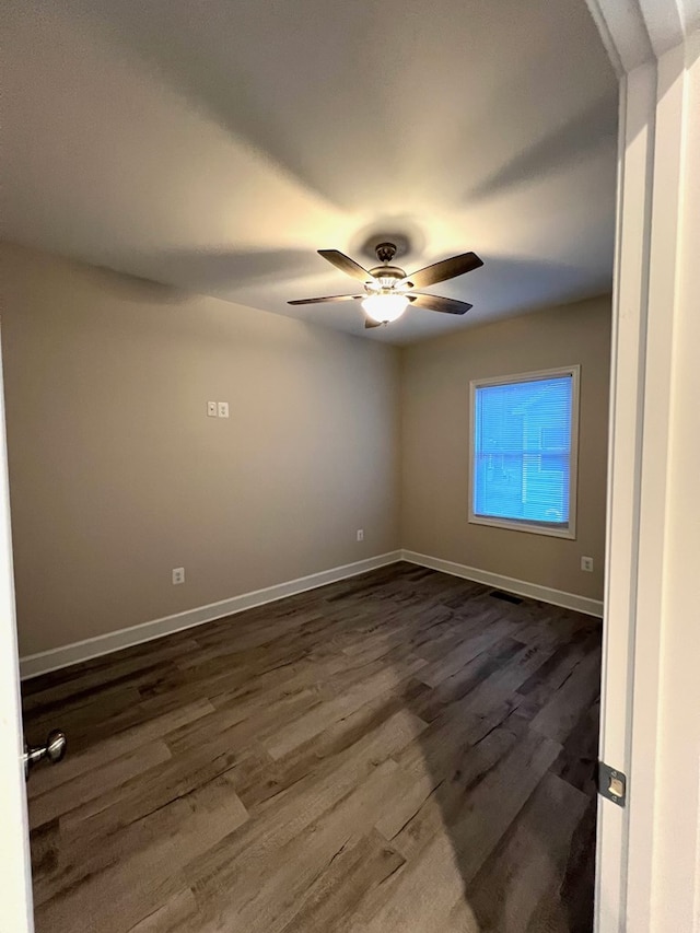 94 Dingley Rd, Va, VA 22520 - spare room with dark wood-type flooring and a ceiling fan