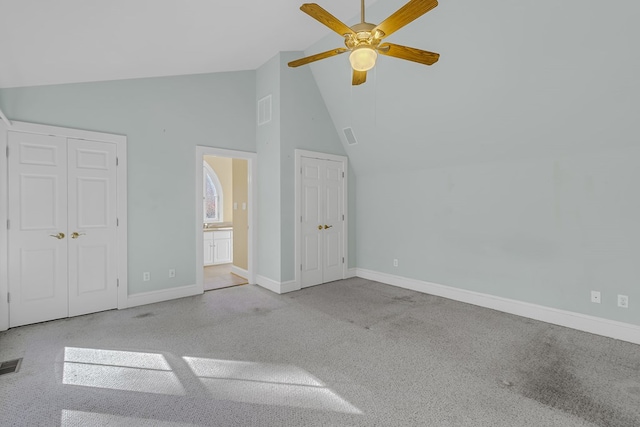 interior space with ceiling fan and lofted ceiling