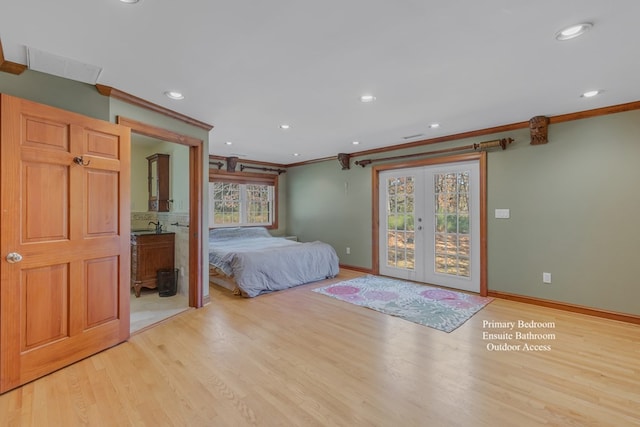 unfurnished bedroom featuring french doors, light wood-type flooring, multiple windows, and ornamental molding