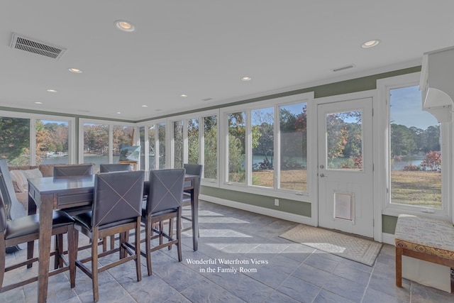 sunroom featuring plenty of natural light