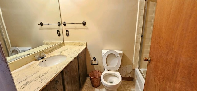 full bathroom featuring vanity, tile patterned floors, combined bath / shower with glass door, toilet, and baseboard heating