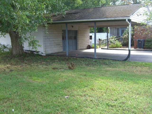 exterior space featuring cooling unit and a carport