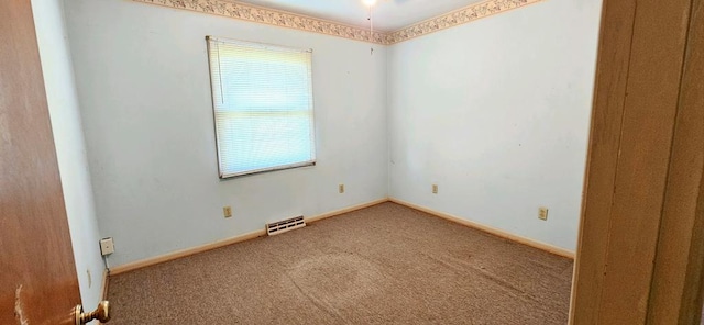 unfurnished room featuring carpet floors