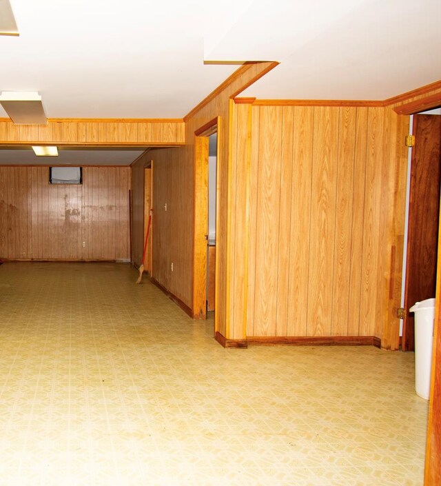 203 Lampkintown Rd, Burgess, VA 22432 - empty room featuring wood walls and light flooring
