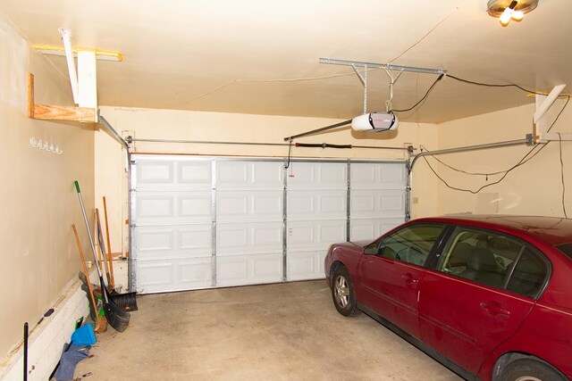 203 Lampkintown Rd, Burgess, VA 22432 - garage with a garage door opener
