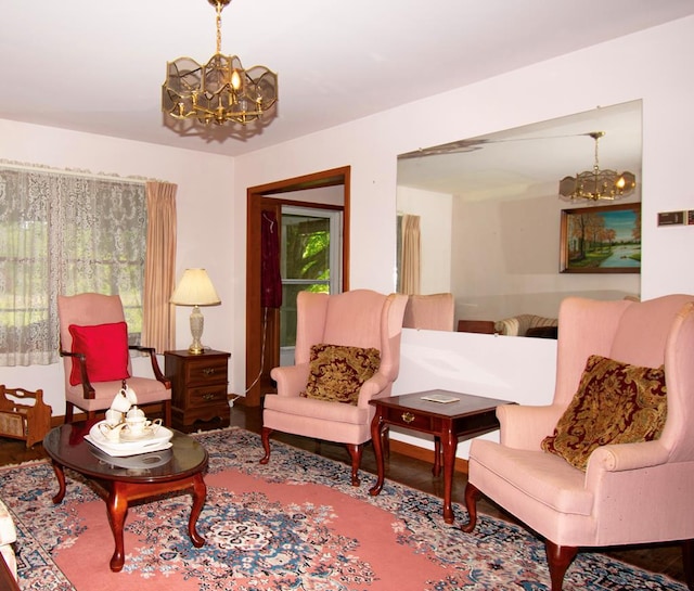 203 Lampkintown Rd, Burgess, VA 22432 - living area featuring a chandelier and wood finished floors